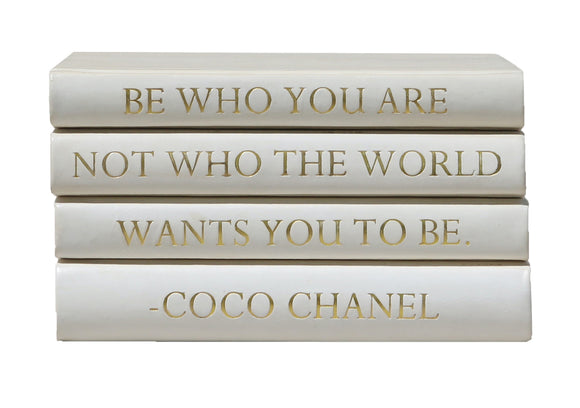 Stack of White Leather Bound Books with Coco Chanel Quote A Girl