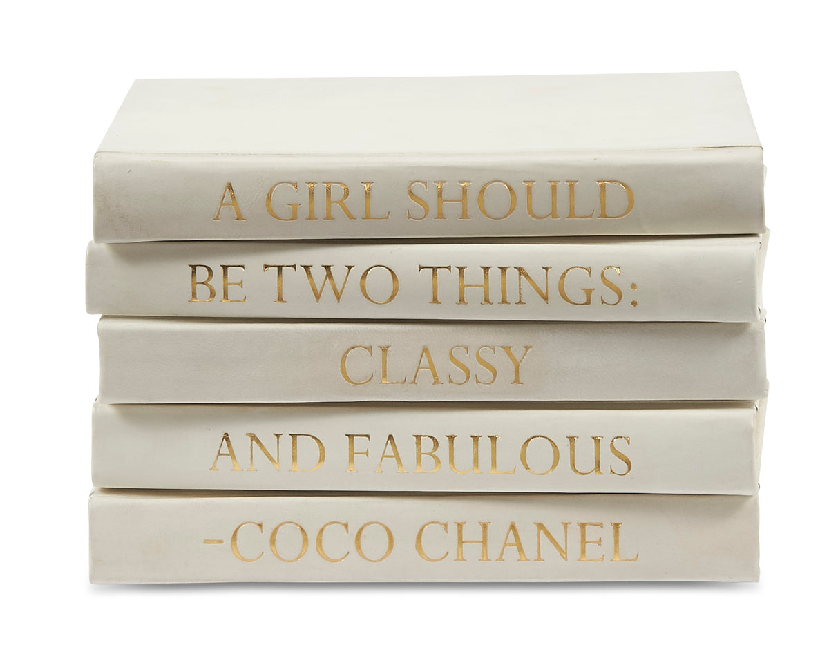 Stack of White Leather Bound Books with Coco Chanel Quote A Girl